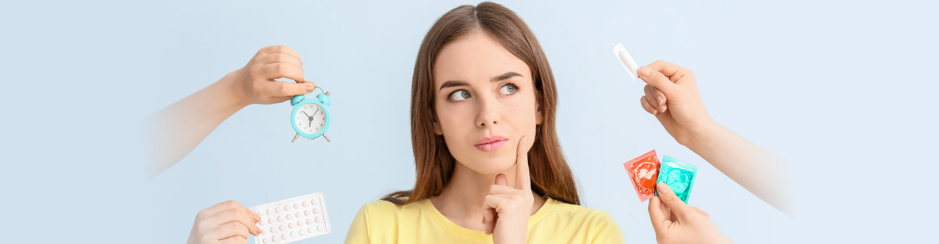 young woman and hands with different means of contraception